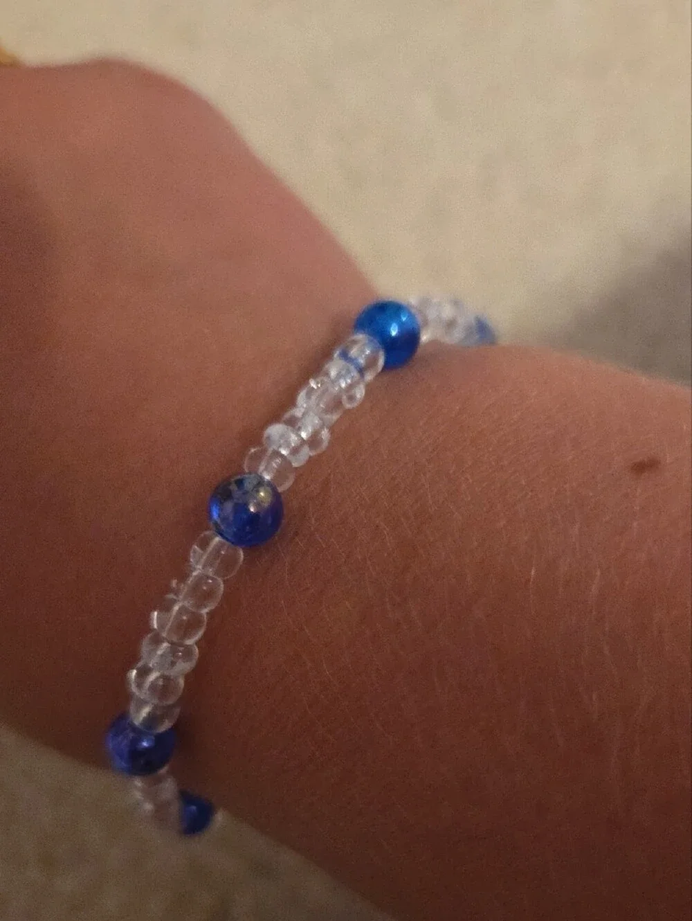 Clear Seed Bead Bracelet with Iridescent Blue Accents